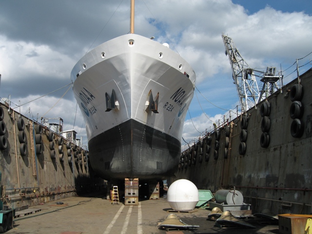 A NOAA ship is repaired in the Fairhaven dry-dock.